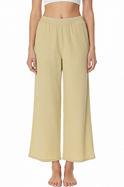 Dámské žluté Volnočasové Kalhoty široké žebrované Vel. 36
