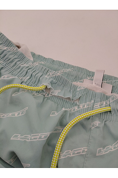 LACOSTE Zelené plavecké kraťasy s potiskem Velikost 16 | LACOSTE | obrázek 7