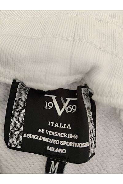 VERSACE Bílé sportovní tepláky s potiskem a gumou na nohavicích Vel. M | VERSACE | obrázek 7