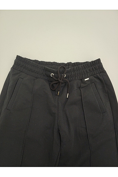 Černé dámské tepláky s kapsami a pružným pasem Velikost EU 40 | Unimoda | obrázek 4