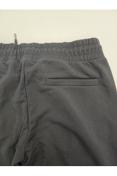 Černé dámské tepláky s kapsami a pružným pasem Velikost EU 40 | Unimoda | obrázek 10